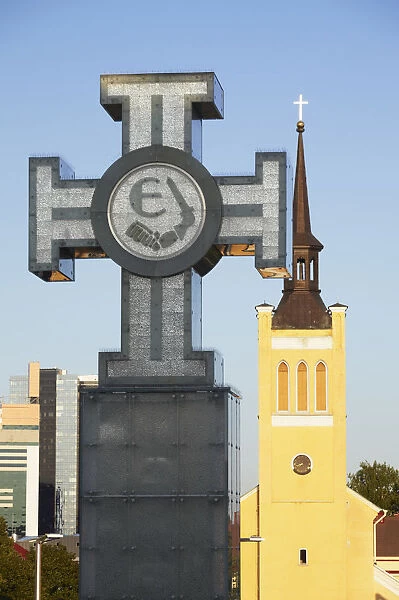 Estonia, Tallinn, Cross In Freedom Square With St Johns Church (Jaani Kirik)