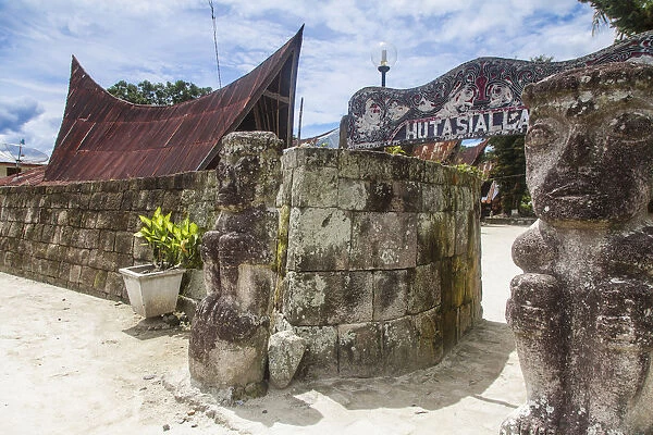 Indonesia, Sumatra, Samosir Island, Lake Toba, Ambarita, Stone statues at Entrance