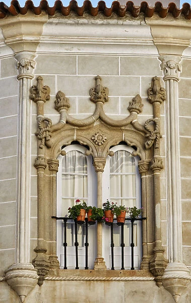 A manueline style window (16th century) in the house of Garcia de Resende
