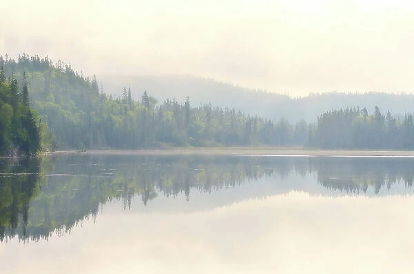 Morning fog on northern lake Near Schreiber, Ontario, Canada