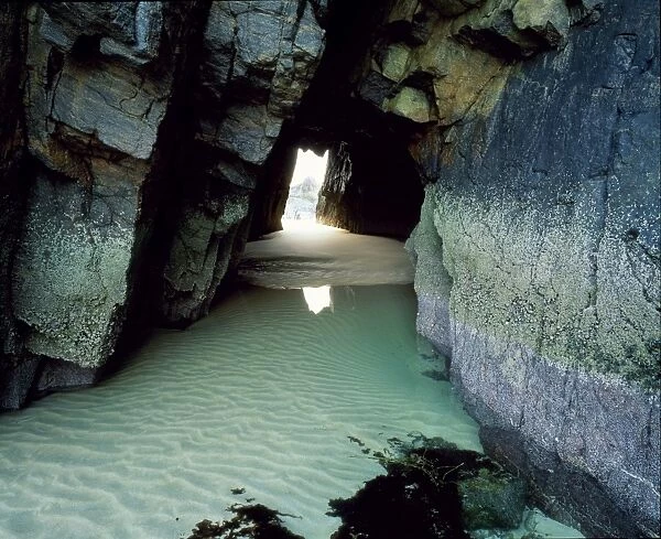 Rights Managed. Rock tunnel at Traigh Mhor, North Lewis, Isle of Lewis