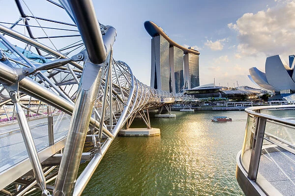 Singapore, the Helix bridge leading across Marina Bay to the Marina Bay Sands hotel