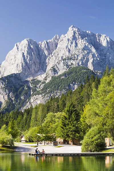 Slovenia, Gorenjska Region, Kranjska Gora. Lake Jasna and the mountain Prisank