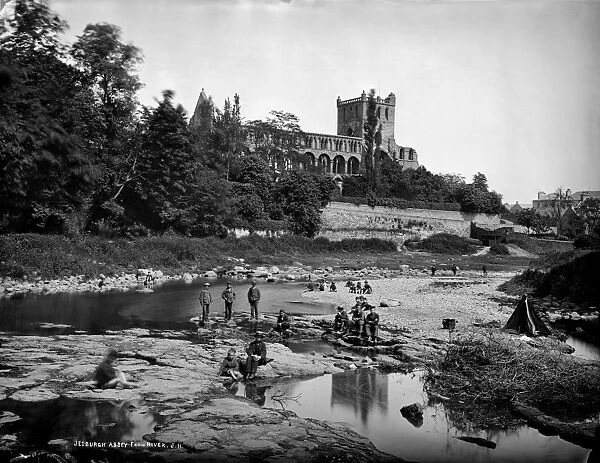 View looking across river Jed to Jedburgh Abbey. Date: c1887