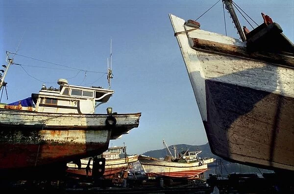 20046174. SOUTH KOREA Pusan View of ships in for repair at dry docks