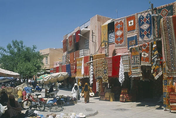 20067628. MOROCCO Marrakesh The souk with carpets displayed
