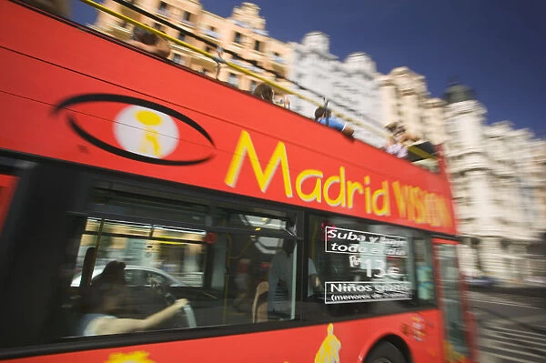 20074376. SPAIN Madrid Red sight seeing bus on the Gran Via
