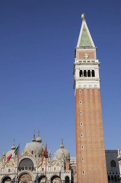 Italy, Veneto, Venice, domes of the Basilica of San Marco with flags