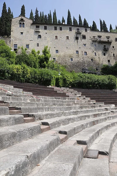 Italy, Veneto, Verona, theatre steps with Castle San Pietro backdrop, Teatro Romano