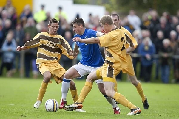 Rangers' Fraser Aird in Action: Scottish Cup Second Round Win Against Forres Mechanics (0-1)