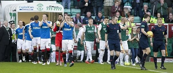 Rangers and Hibernian Players Exit Tunnel: Ladbrokes Championship Showdown at Easter Road
