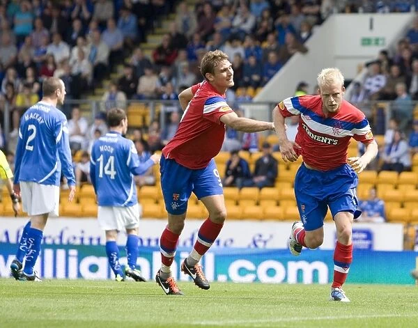 Rangers' Steven Naismith Celebrates Glory: 2-0 Win Against St. Johnstone in Scottish Premier League