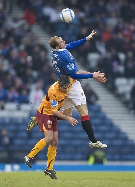 Steven Whittaker vs Keith Lasley: Intense Rivalry in the Co-operative Insurance Scottish Cup Semi-Final at Hampden Park (Rangers 2-1 Motherwell)