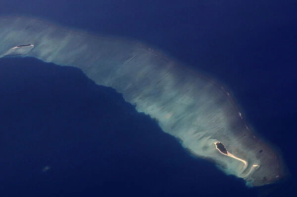 An aerial view of an atoll in the Maldives