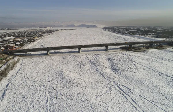 An aerial view shows a bridge across the Yenisei River in Kyzyl