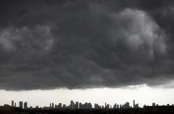 Dark clouds pass over downtown Miami, Florida