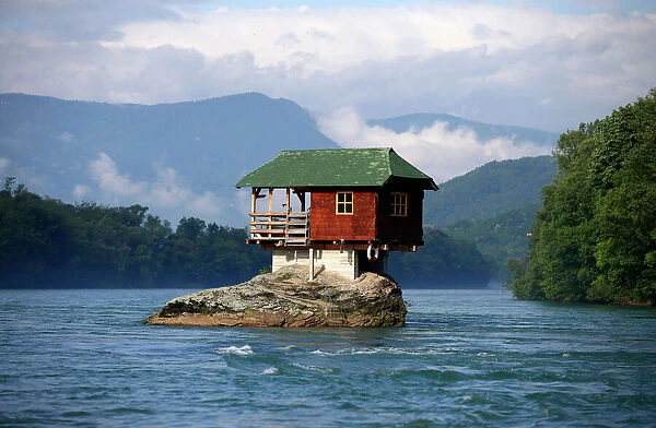A house built on a rock on the river Drina is seen near the western Serbian town of