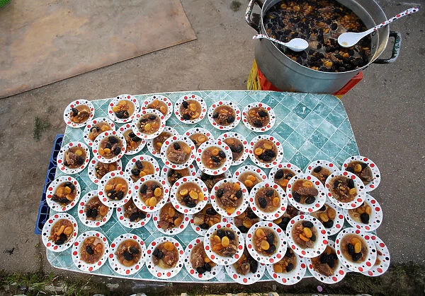 A sweet Algerian dish is seen before being distributed for iftar (breaking fast