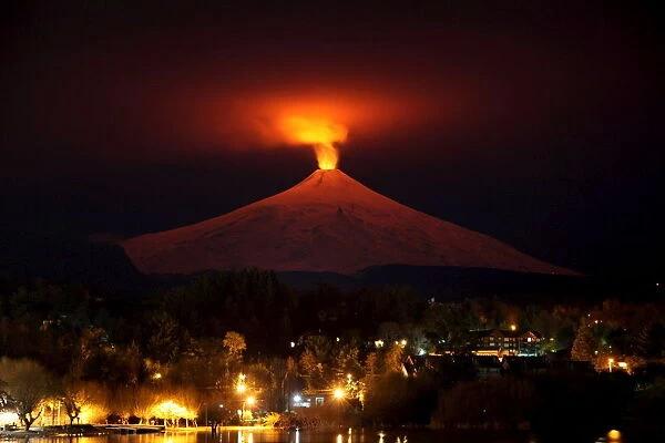 The Villarrica Volcano Is Seen At Night From Pucon Town Photos Framed Prints