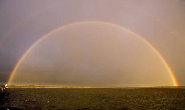 Rainbow over Lindisfarne Holy Island Northumberland autumn