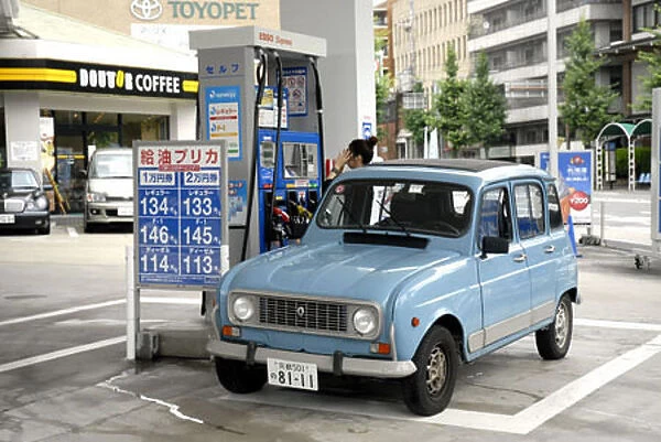 Filling up car with petrol Kyoto -