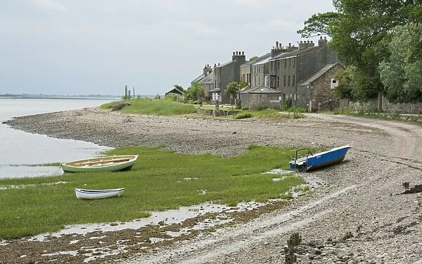81235-04525-821. View of boats on shoreline and houses of coastal village