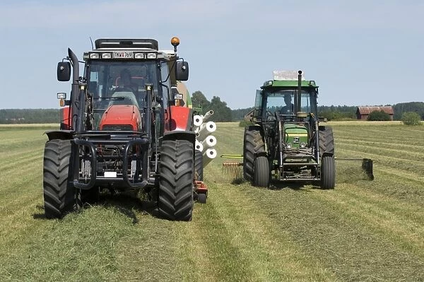 90325-00131-755. Tractors with rotary rake and baler, turning cut grass