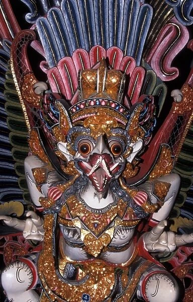 Indonesia A painted wood carving of a mythological creature  /  Bali