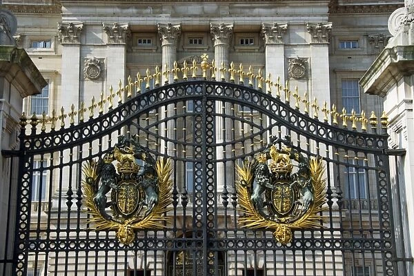 Royal coat of arms on palace gates, Buckingham Palace, City of Westminster, London, England, april