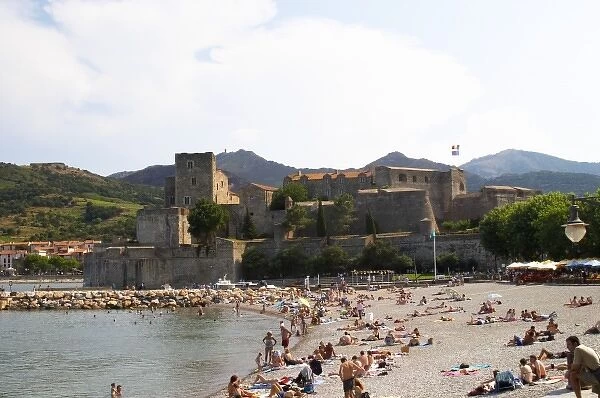 The beach in the village. The chateau in Collioure harbour. Collioure. Roussillon