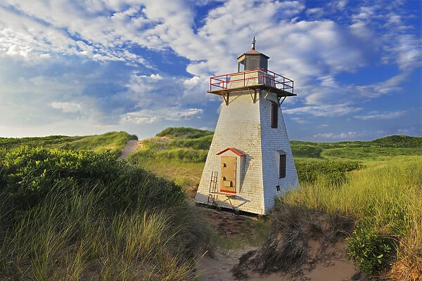 Canada, Prince Edward Island, St. Peters Harbour. Lighthouse in sand dunes. Credit as