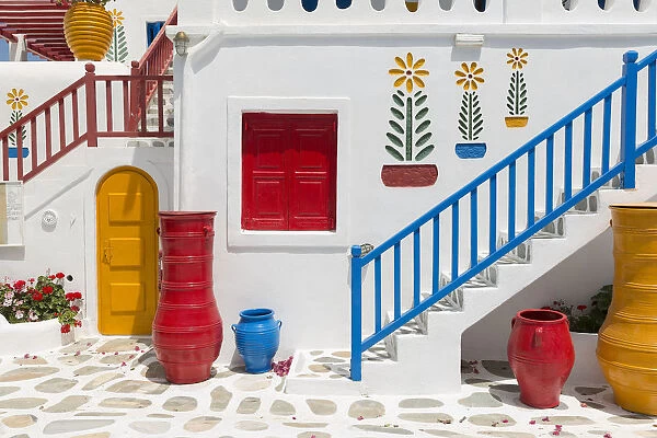Europe, Greece, Mykonos. Hotel exterior stairway and pots
