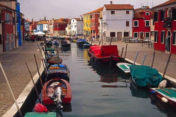 Europe, Italy, Venice, Burano. Colorful homes along canal on the island of Burano