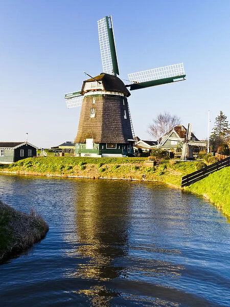 Europe; Netherlands; Nord Holland; Windmill along canal of Nord Holland