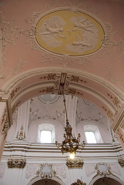 Hungary, Kalocsa. Historic baroque Kalocsa Cathedral. Ornate pink & white interior