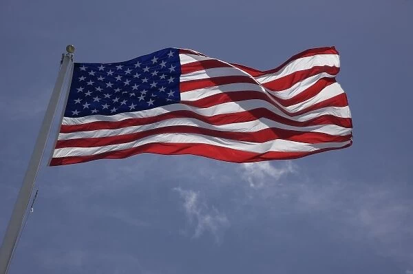 North America, USA, Hawaii, O ahu, Pearl Harbor. An American Flag waving in the wind