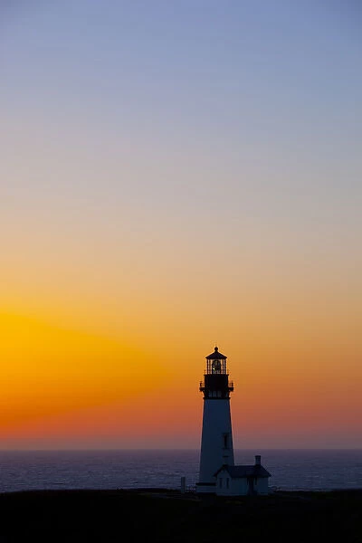 OR, Oregon Coast, Newport, Yaquina Head lighthouse after sunset, completed in 1873