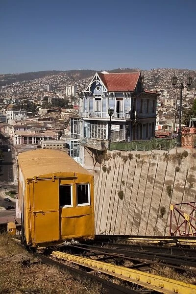 South America, Chile, Valparaiso. A tram rises up Artillery Hill. (UNESCO World Heritage