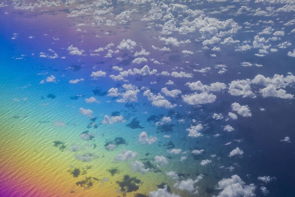 U. S. Virgin Islands, St. Thomas. Aerial view of clouds and rainbow over the Caribbean Sea