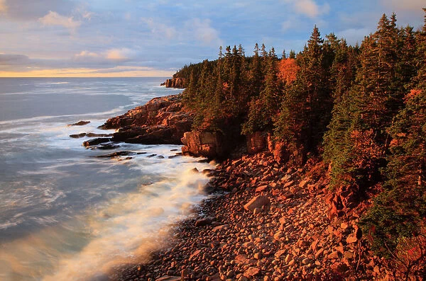 USA; Maine; Acadia National Park; Ocean waves breaking on rocks along Ocean Drive