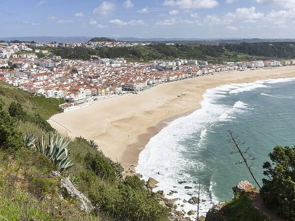 View over town and beach from Sitio. The town Nazare on the coast of the Atlantic Ocean