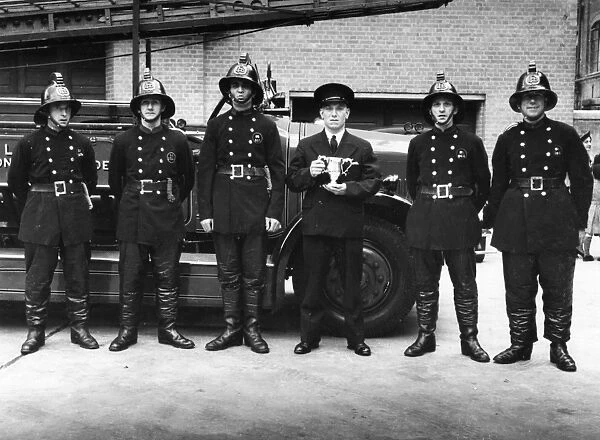 LFB firefighting crew with open pump vehicle