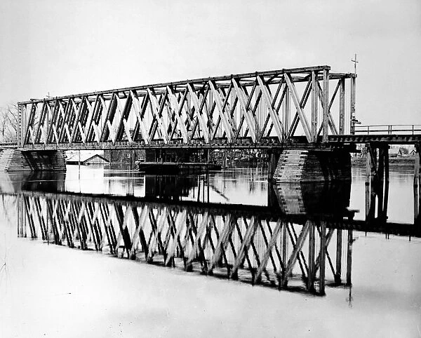 0081921. RAILROAD BRIDGE: RED RIVER.. The original Northern Pacific Railroad