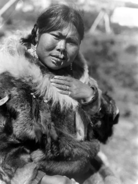 ALASKA: ESKIMO WOMAN. A Nunivak woman identified as Dahchihtok wearing nose ornament and labrets