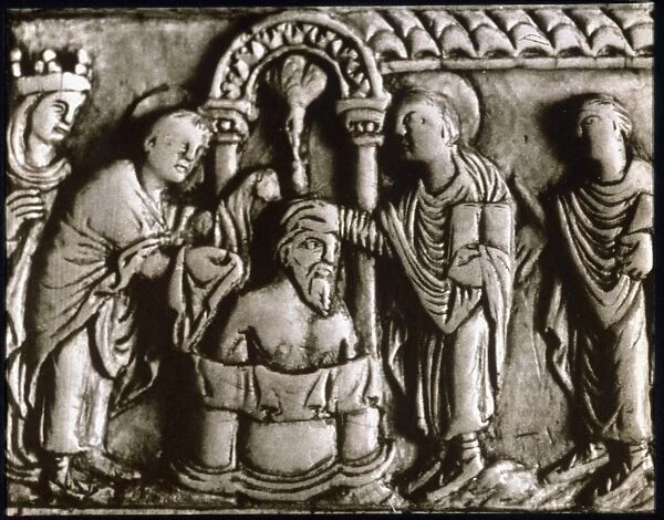 BAPTISM OF CLOVIS I, 496 A. D. St. Remi baptizing Clovis I as Queen Clotilda watches. Detail from ivory diptych, 9th century