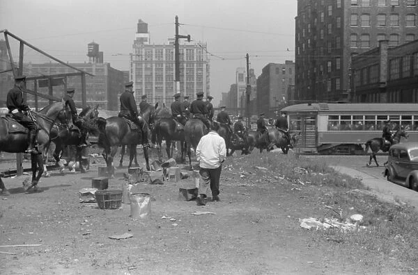 CHICAGO: MOUNTED POLICE. Mounted police in Chicago, Illinois. Photograph by John Vachon