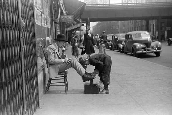 CHICAGO: SHOESHINE, 1941. A shoeshine on 47th Street on the South Side of Chicago, Illinois