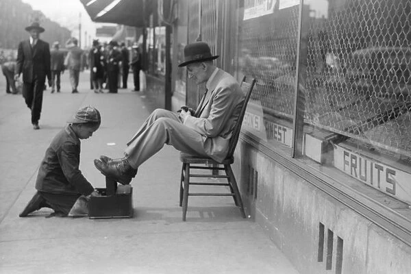 CHICAGO: SHOESHINE, 1941. A shoeshine on 47th Street on the South Side of Chicago, Illinois