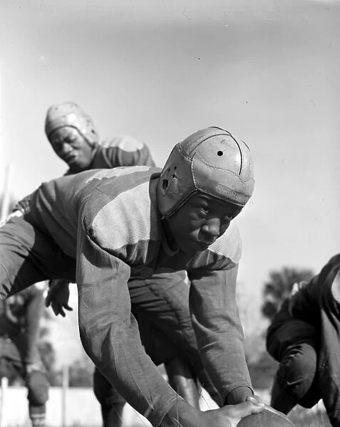 FOOTBALL TEAM, 1943. A football player from Bethune-Cookman College in Daytona Beach, Florida