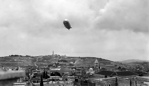 The Graff Zeppelin over Jerusalem with the Mount of Olives and the Garden of Gethsemane in the background, East Jerusalem. Photograph, c1912